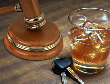 Drink and keys and gavel
