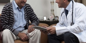 A doctor giving end-of-life counseling to a patient