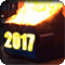 A dumpster on fire with the year 2017 on the front