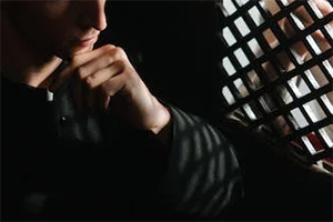 A priest taking confession