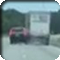 still from video of BCBSNC president Patrick Conway sideswiping tractor trailer on interstate 85