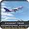 FedEx plane taking off over the sign at Piedmont Triad Airport