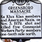 The historical marker sign for the Greensboro Massacre