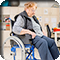 A female nursing home patient in a wheelchair